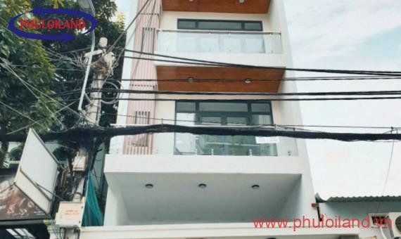 Bán tòa nhà phố có hầm và thang máy, mặt tiền đường số 25A, phường Tân Quy, Quận 7