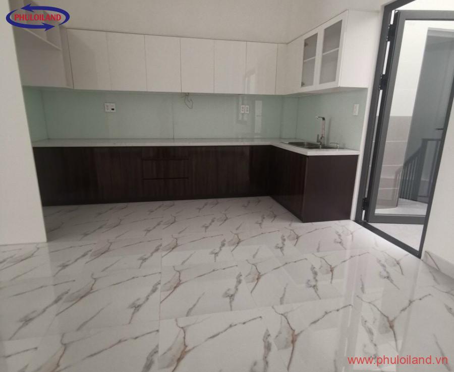 khu vuc bep 7 900x738 - Bán tòa nhà phố có hầm và thang máy, mặt tiền đường số 25A, phường Tân Quy, Quận 7