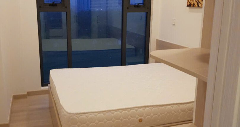 phong ngu can ho ban day du thiet bi noi that 810x430 - Giá mua bán căn hộ 2pn block B chung cư Cardinal Court Quận 7 T3/2025