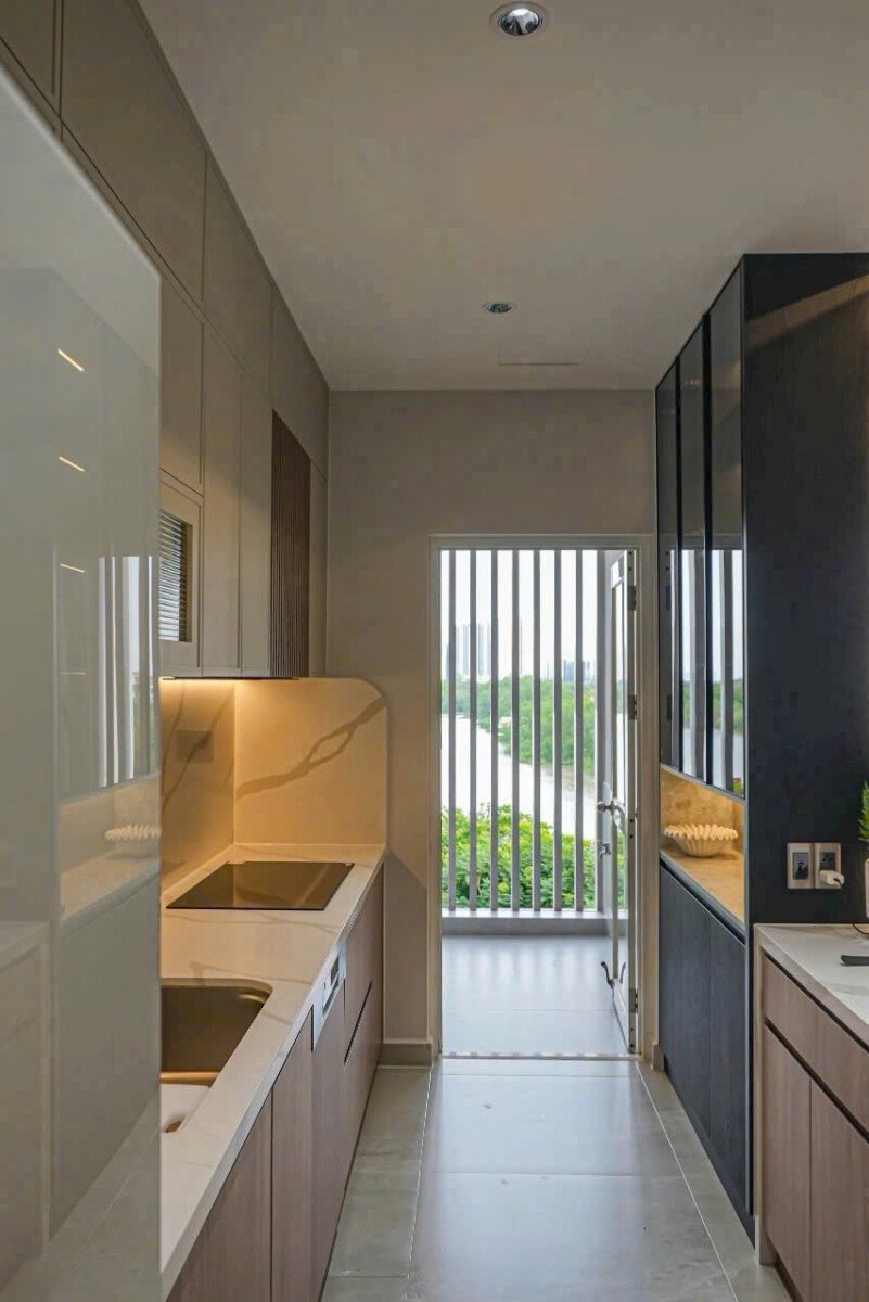 khong gian bep can ho ban - Giá mua bán căn hộ 3pn chung cư Riverpark Residence phường Tân Hưng T5/2026