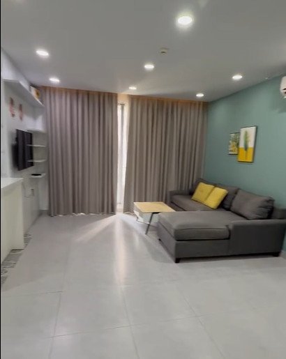 phong khach can ho ban 10 - Giá mua bán căn hộ 2pn tòa C số 06 chung cư Green Valley phường Tân Mỹ T7/2026